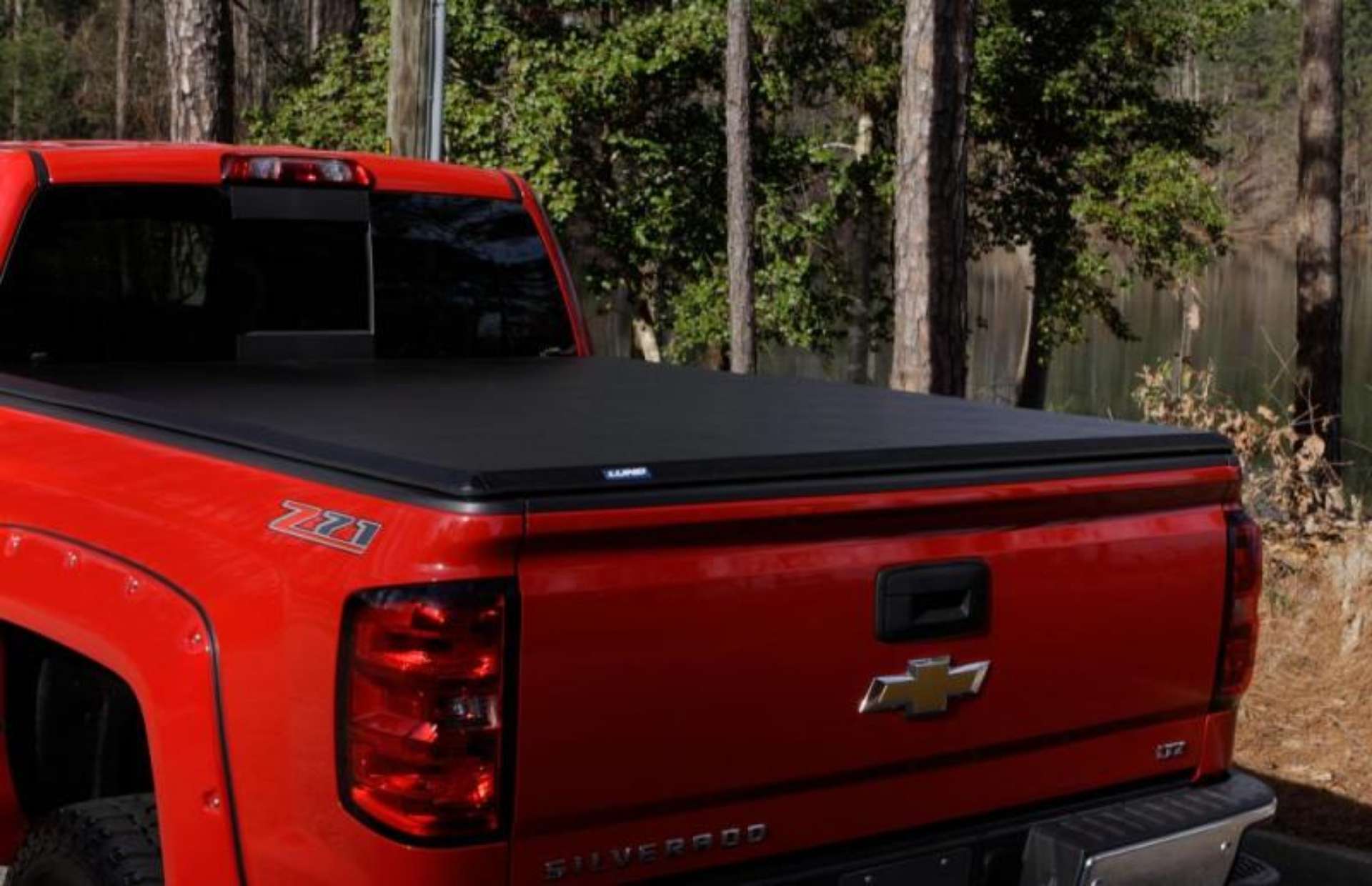 Picture of Lund 04-15 Nissan Titan 5-5ft- Bed Hard Fold Tonneau Cover w-Bracket Kit - Black