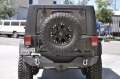 Picture of DV8 Offroad 07-18 Jeep Wrangler JK Rear Aluminum Bumper w- Tire Carrier - Black