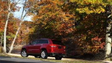 Picture of Corsa 2014-2021 Jeep Grand Cherokee Summit Edition Polished 2-5in Dual Rear Exit Cat-Back Exhaust