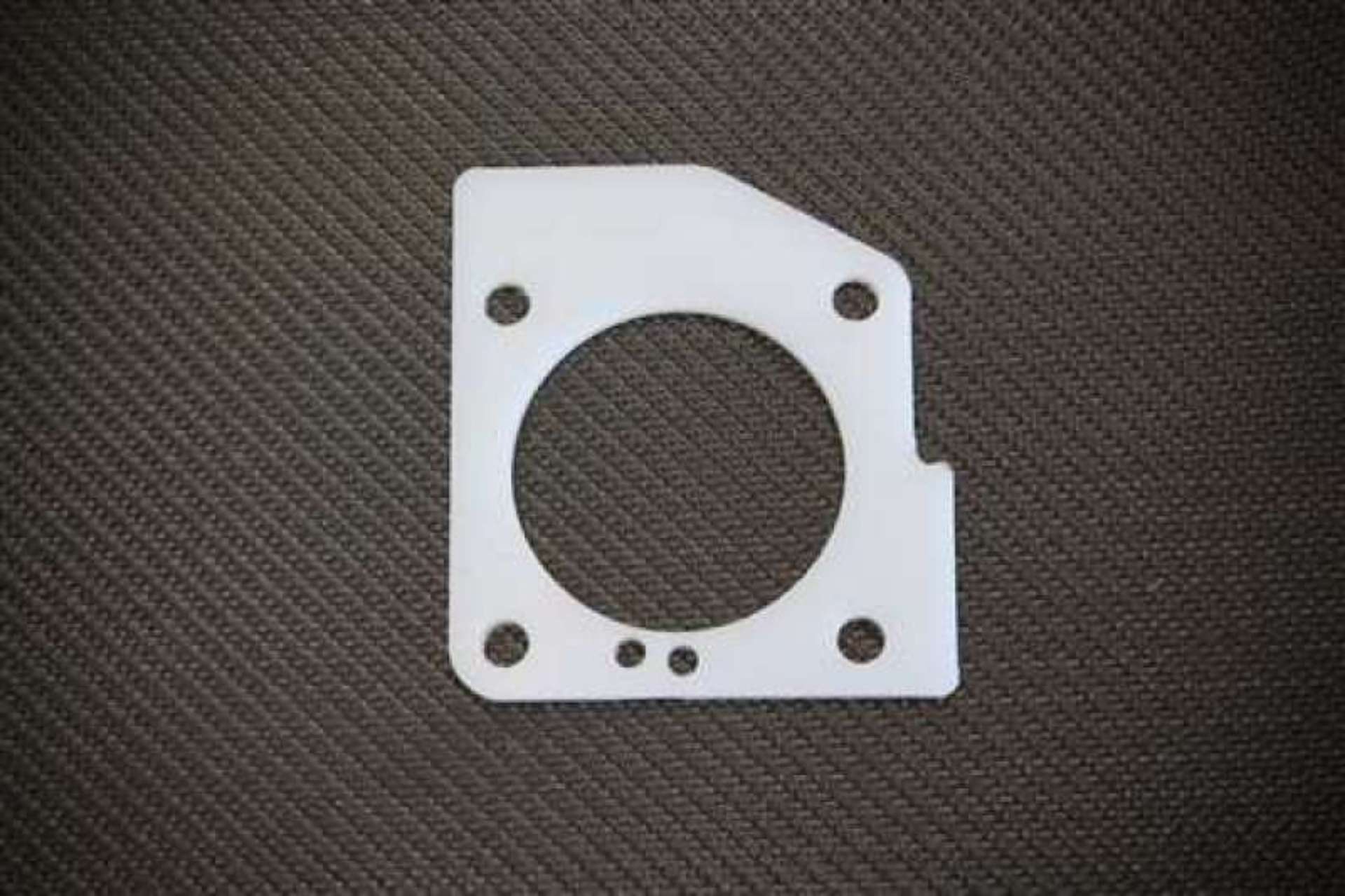 Picture of Torque Solution Thermal Throttle Body Gasket: DSM Eclipse - Talon 2nd Gen 4G63 Turbo Only