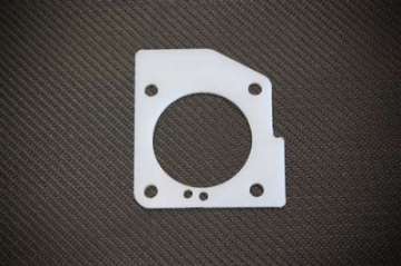 Picture of Torque Solution Thermal Throttle Body Gasket: Mitsubishi 3000GT 1991-1999