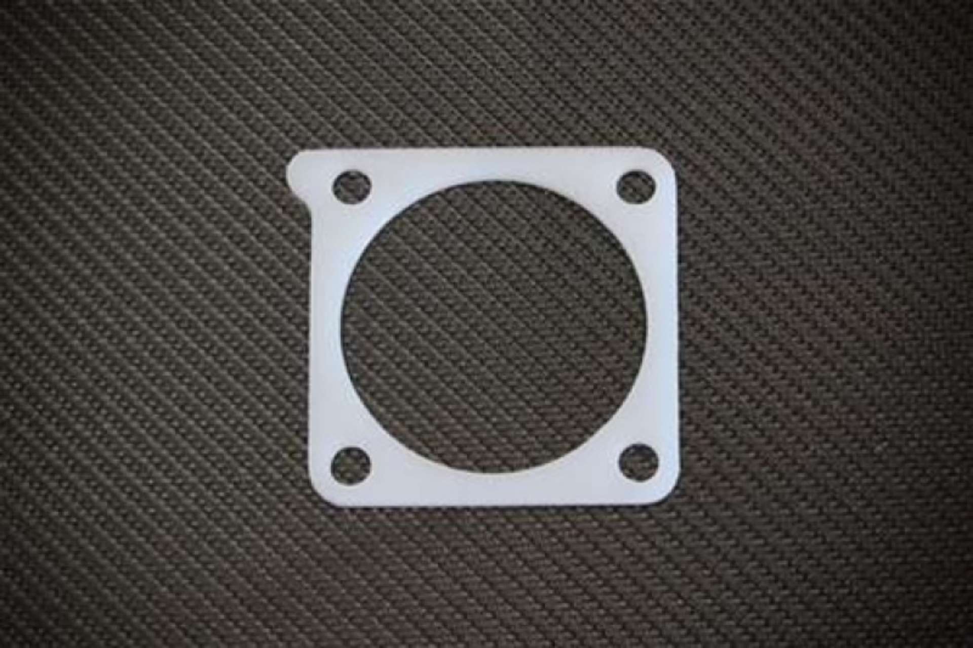 Picture of Torque Solution Thermal Throttle Body Gasket: Mitsubishi Galant 2-4L 2004-2011