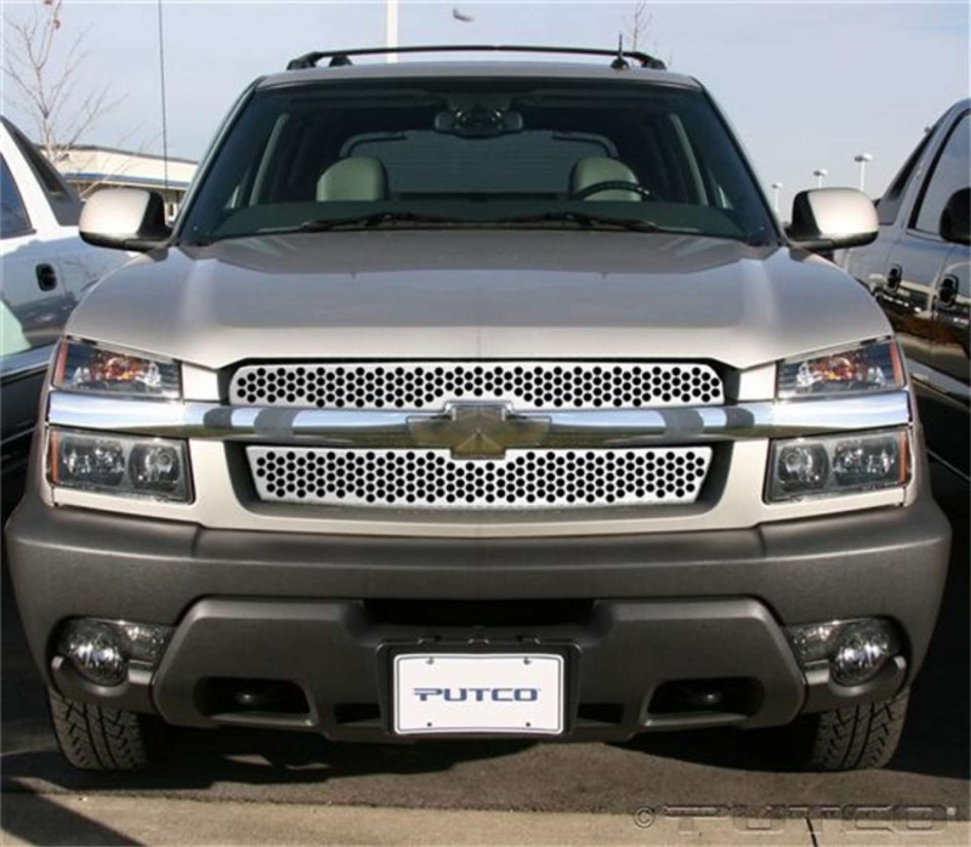 Picture of Putco 02-06 Chevrolet Avalanche w-Body Cladding Punch Stainless Steel Grilles