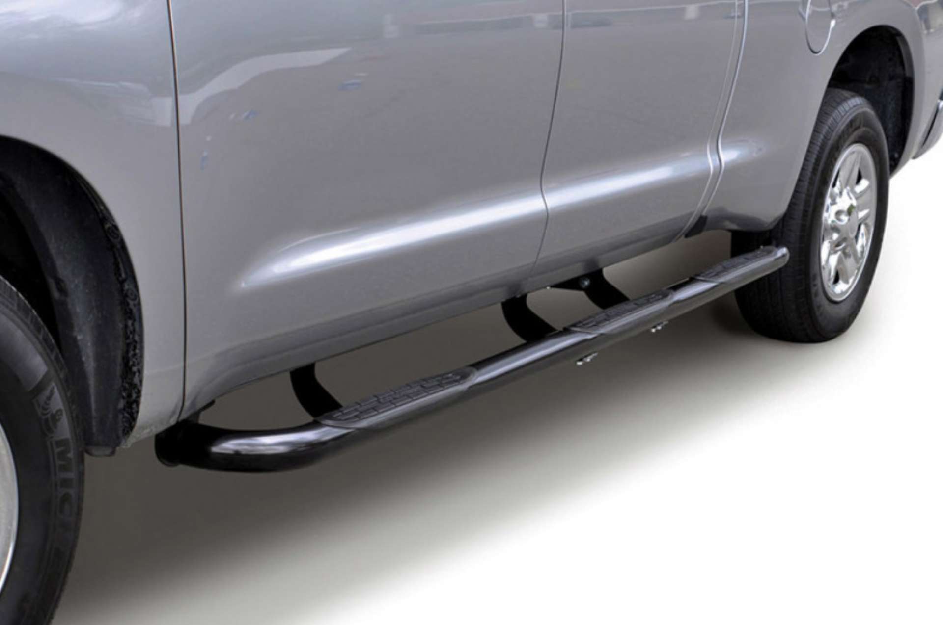 Picture of Go Rhino 01-14 Chevrolet Silverado 2500HD-3500HD 6000 Series SideSteps - One Piece W2W - Black