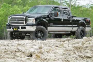 Picture of Superlift 05-07 Ford F-250-F-350 SD 4WD 4in Lift Kit w-Repl Radius Arms & King Coilovers Rear Shocks