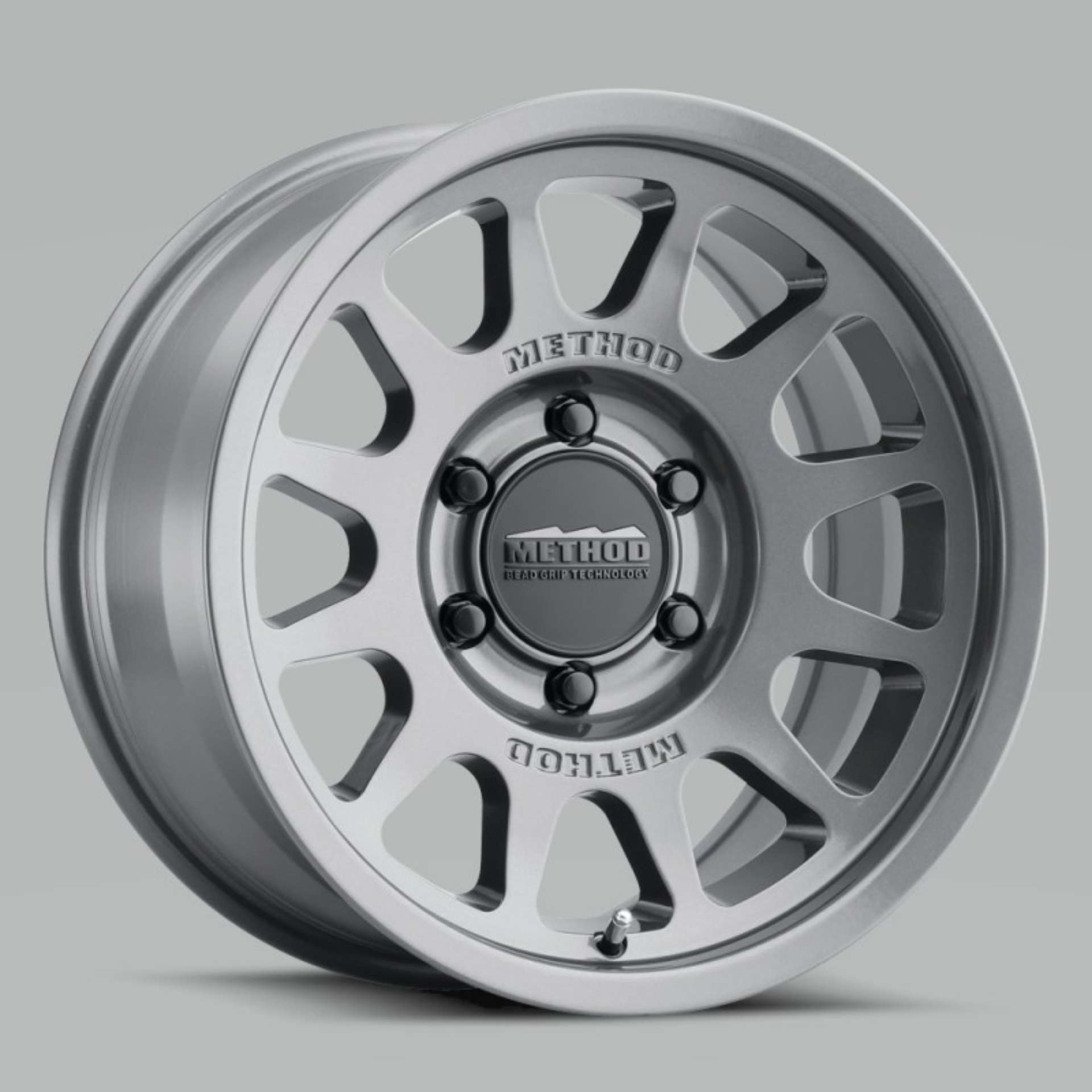 Picture of Method MR703 15x7 +15mm Offset 5x100 56-1mm CB Gloss Titanium Wheel