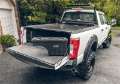 Picture of UnderCover 17-20 Ford F-250-F-350 Passengers Side Swing Case - Black Smooth