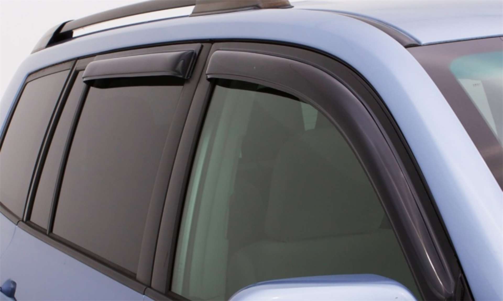 Picture of AVS 20-22 Toyota Corolla Excl- Hatchback Ventvisor Outside Mount Window Deflectors 4pc - Smoke