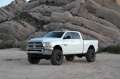 Picture of Fabtech 14-18 Ram 2500 4WD 5in Basic System w-Coil Spacers & Perf- Shocks