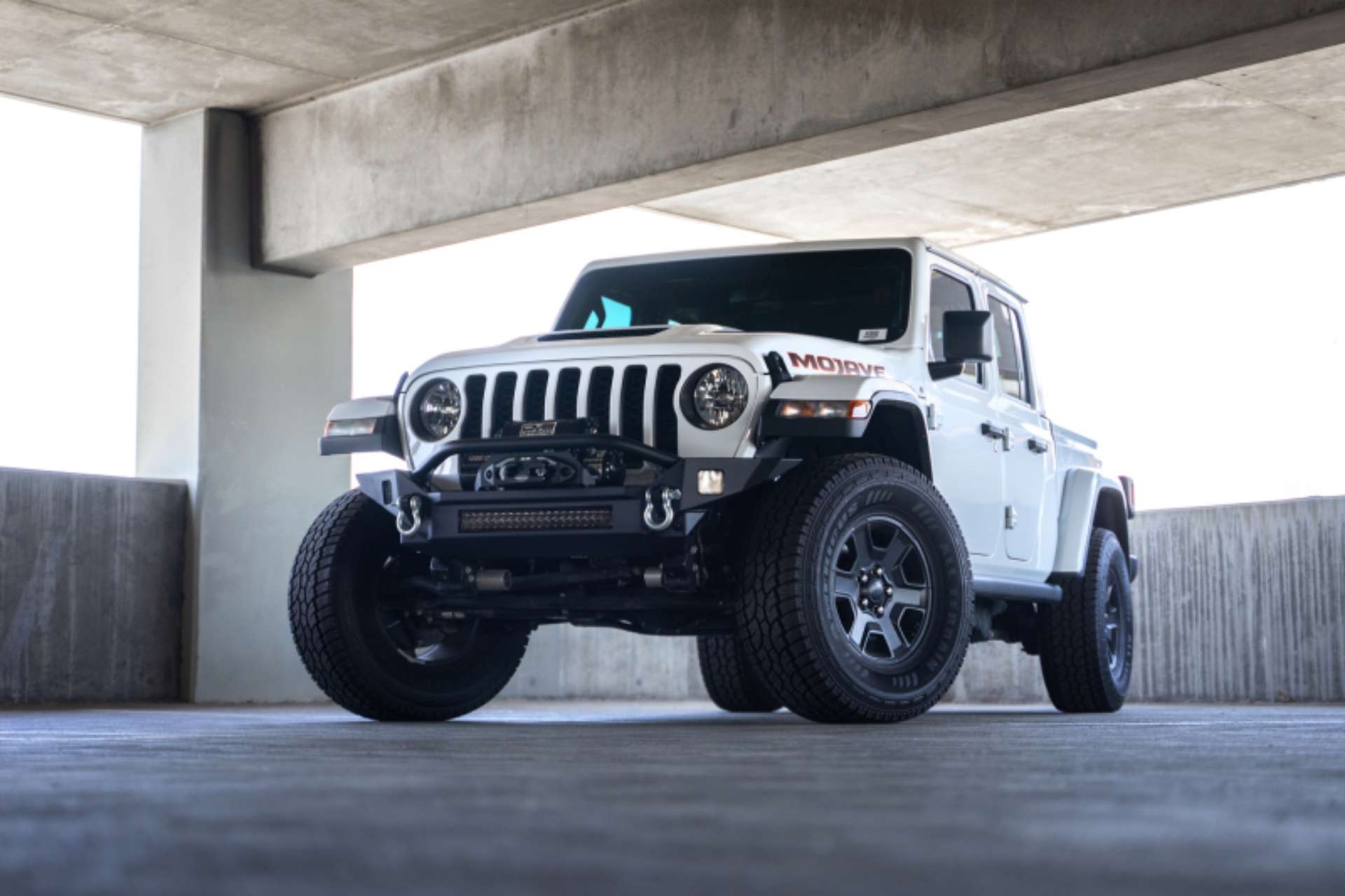 Picture of DV8 Offroad 18-23 Jeep Wrangler JL - 20-23 Jeep Gladiator JT FS-7 Mid-Width Winch Front Bumper