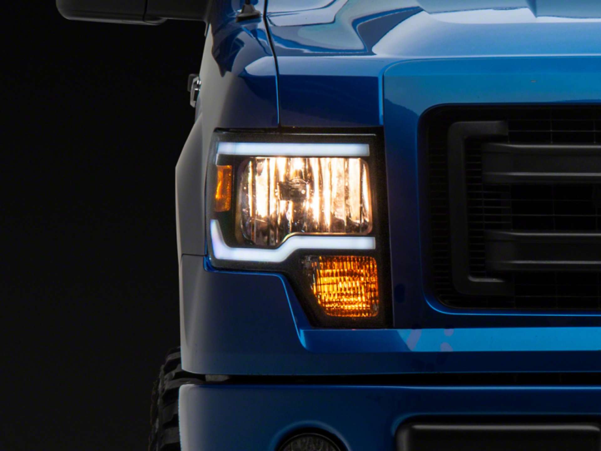 Picture of Raxiom 09-14 Ford F-150 Axial Series Headlight w- SEQL LED Bar- Blk Housing Clear Lens