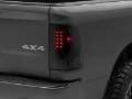 Picture of Raxiom 09-18 Dodge RAM 1500-2500-3500 Axial Series LED Tail Lights- BlkHousing- SmokedLens