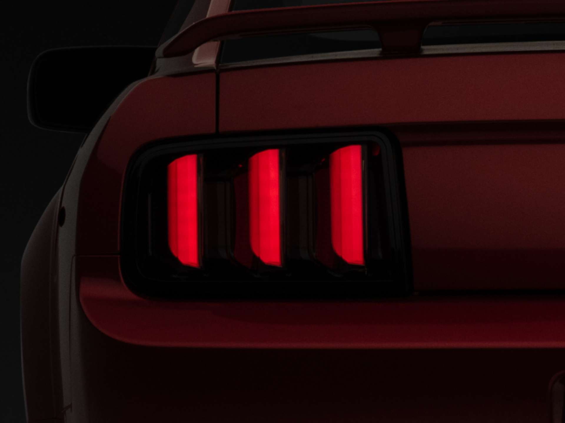 Picture of Raxiom 05-09 Ford Mustang Vector V2 LED Tail Lights- Black Housing Smoked Lens