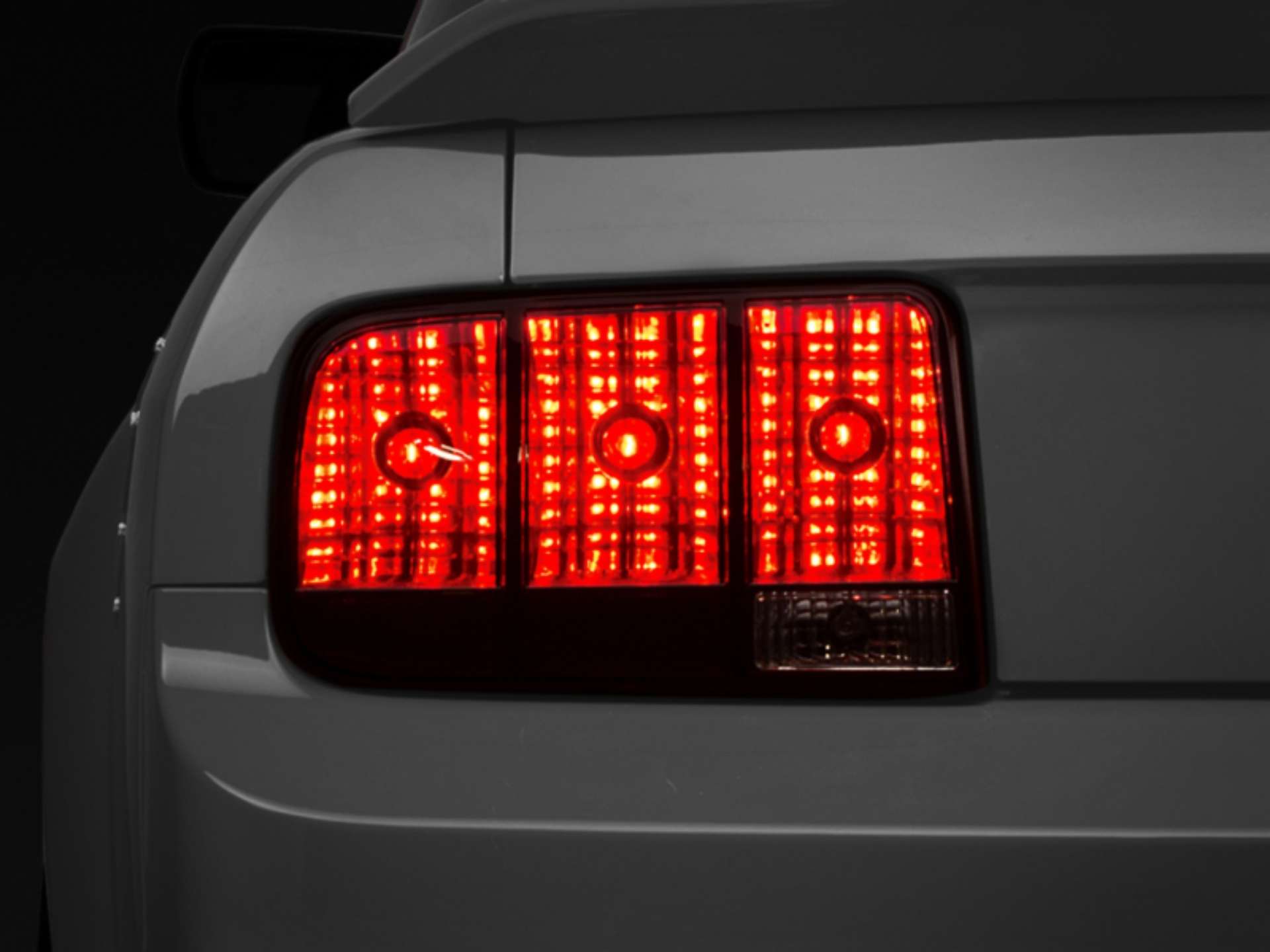 Picture of Raxiom 05-09 Ford Mustang Tail Lights- Black Housing Smoked Lens