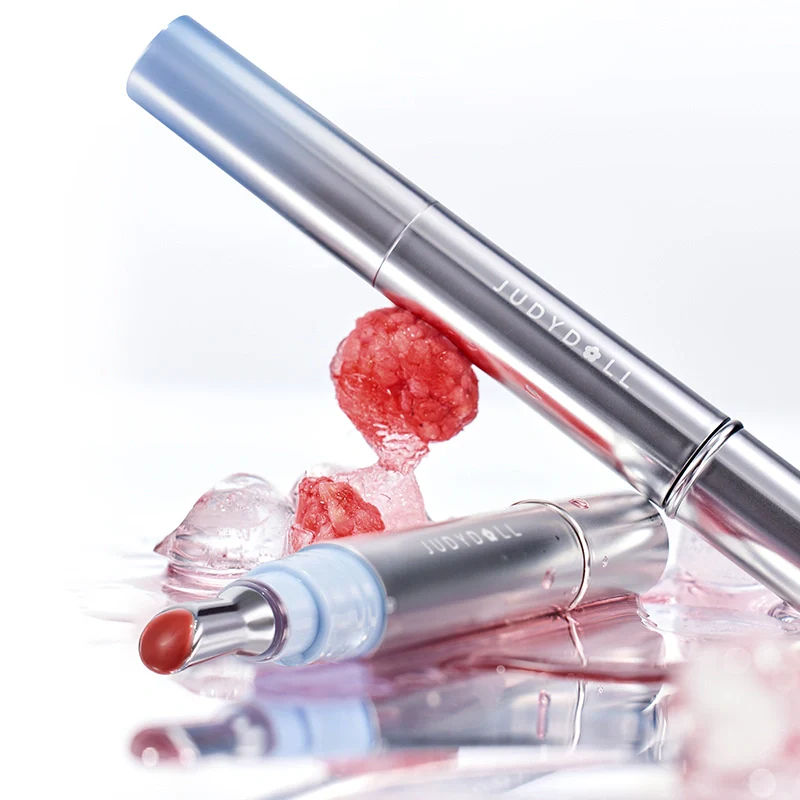 Judydoll Water Essence Lip Glaze kemasan silver metalik — lip gloss watery dengan tekstur melting di bibir