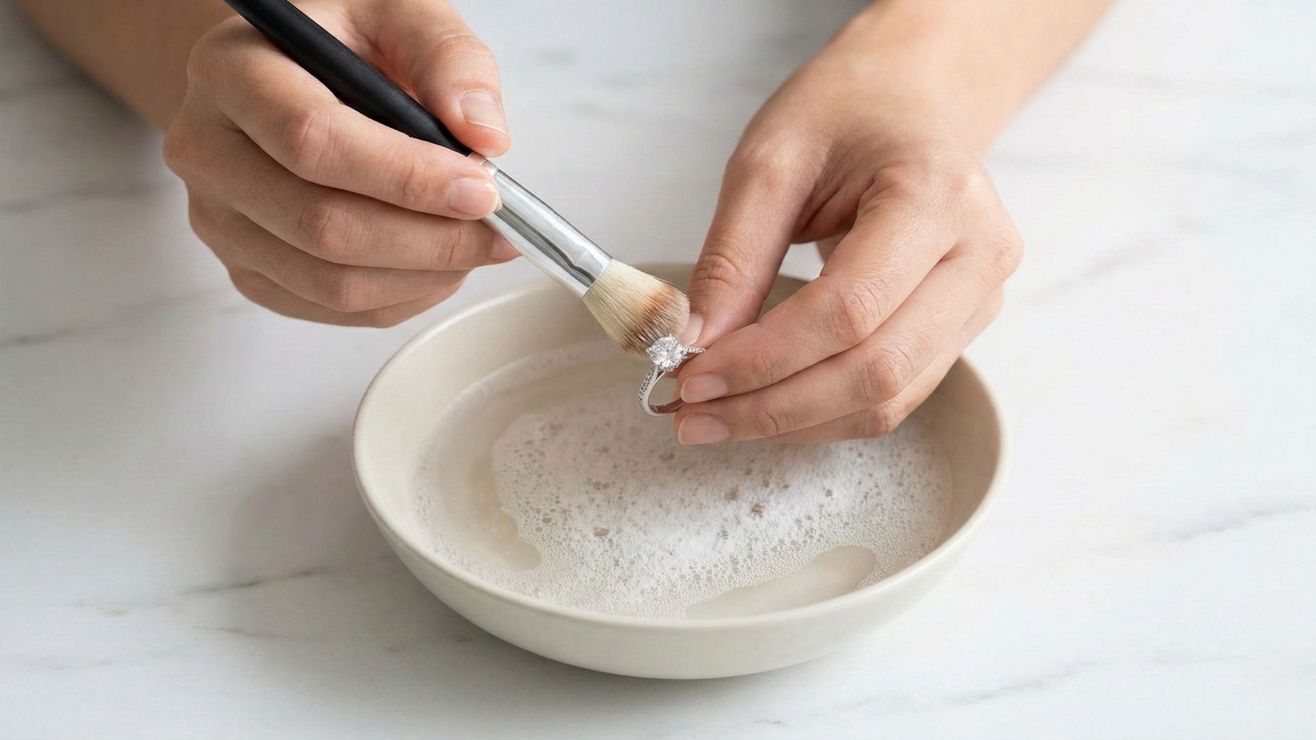 Brushing diamond ring with soft toothbrush