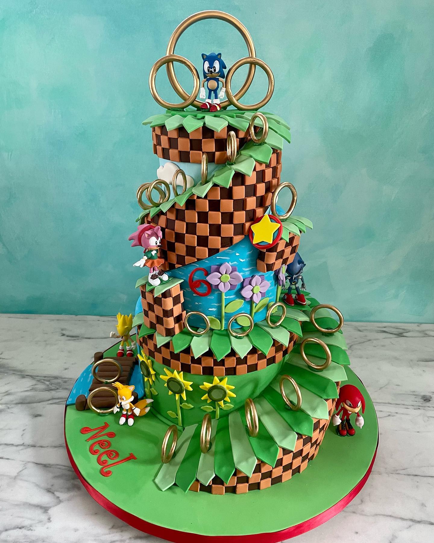 Happy birthday Neel! Love this fun Sonic design. The figurines are toys, all else is edible. #sonicthehedgehog #soniccake #sonicthehedgehogcake #sonic