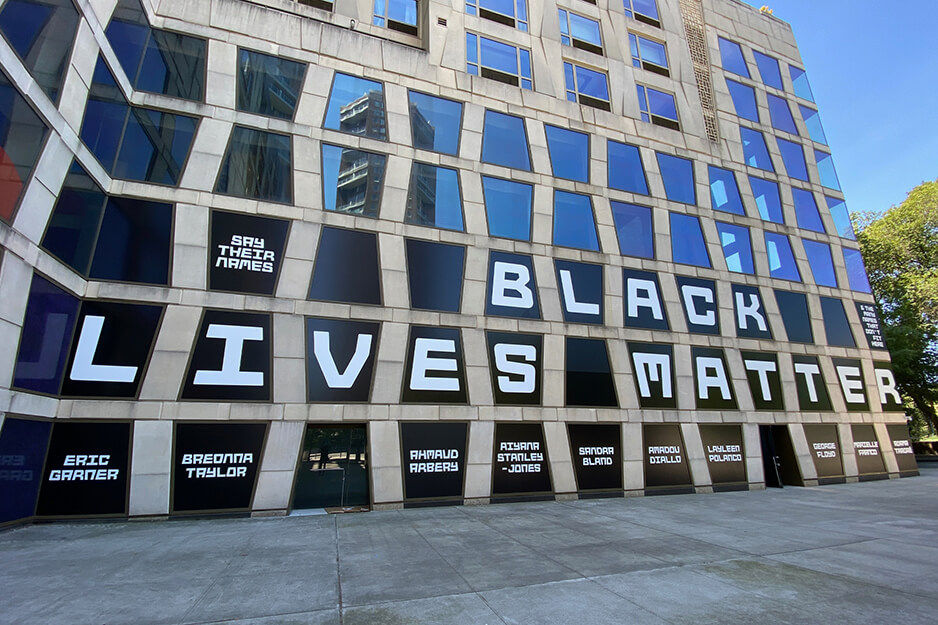 Window graphics printed on a Roland DG TrueVIS VG2 wide-format printer/cutter spell out Black Lives Matter.