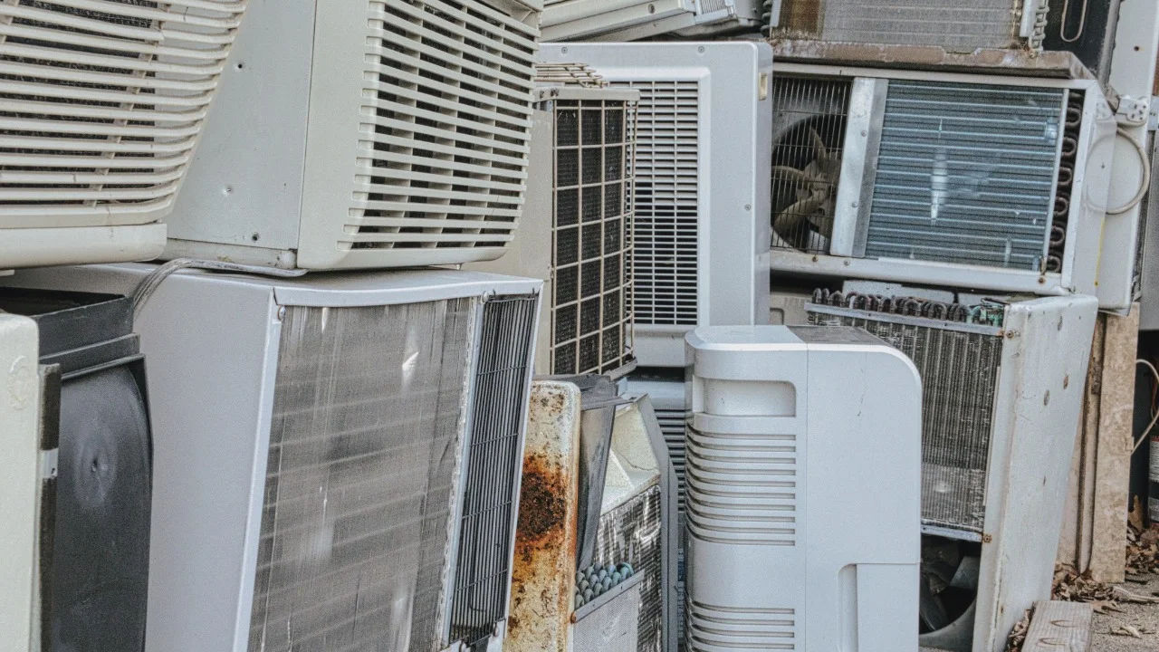 Close-up of an industrial HVAC unit outdoors, showcasing its metal texture.