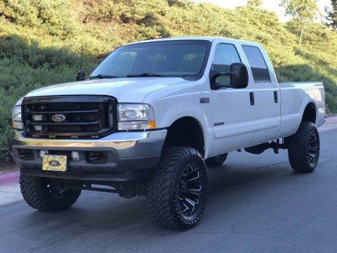 many upgrades 2001 Ford F 350 XLT long bed pickup 4&#215;4 for sale