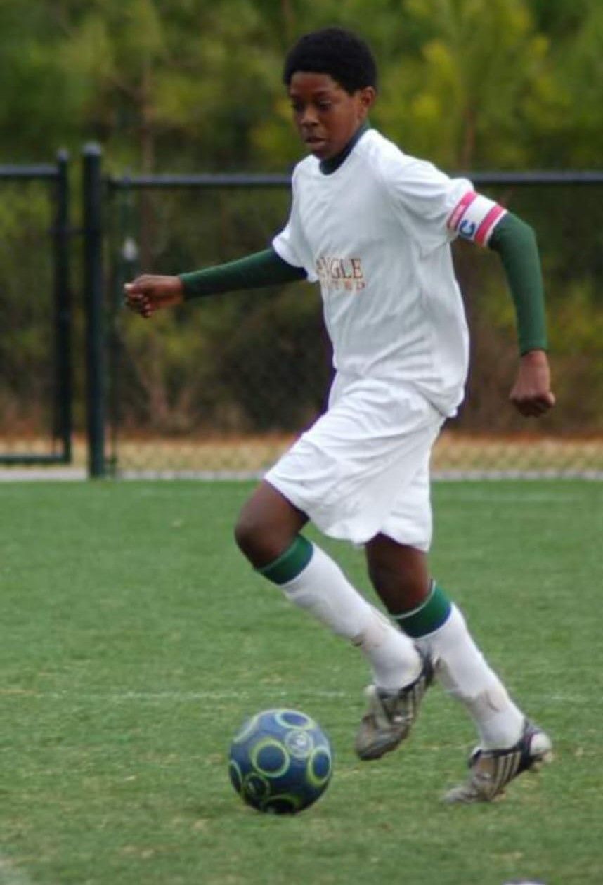 Football player about to receive the ball