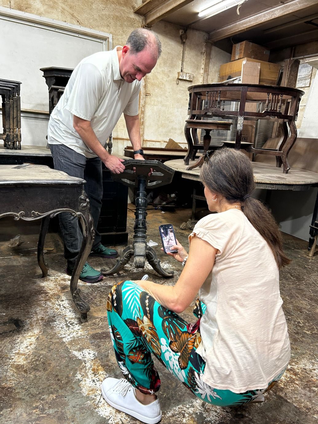 Steve and Danielle Lesser sourcing antique colonial furniture in India for The Past Perfect Collection.