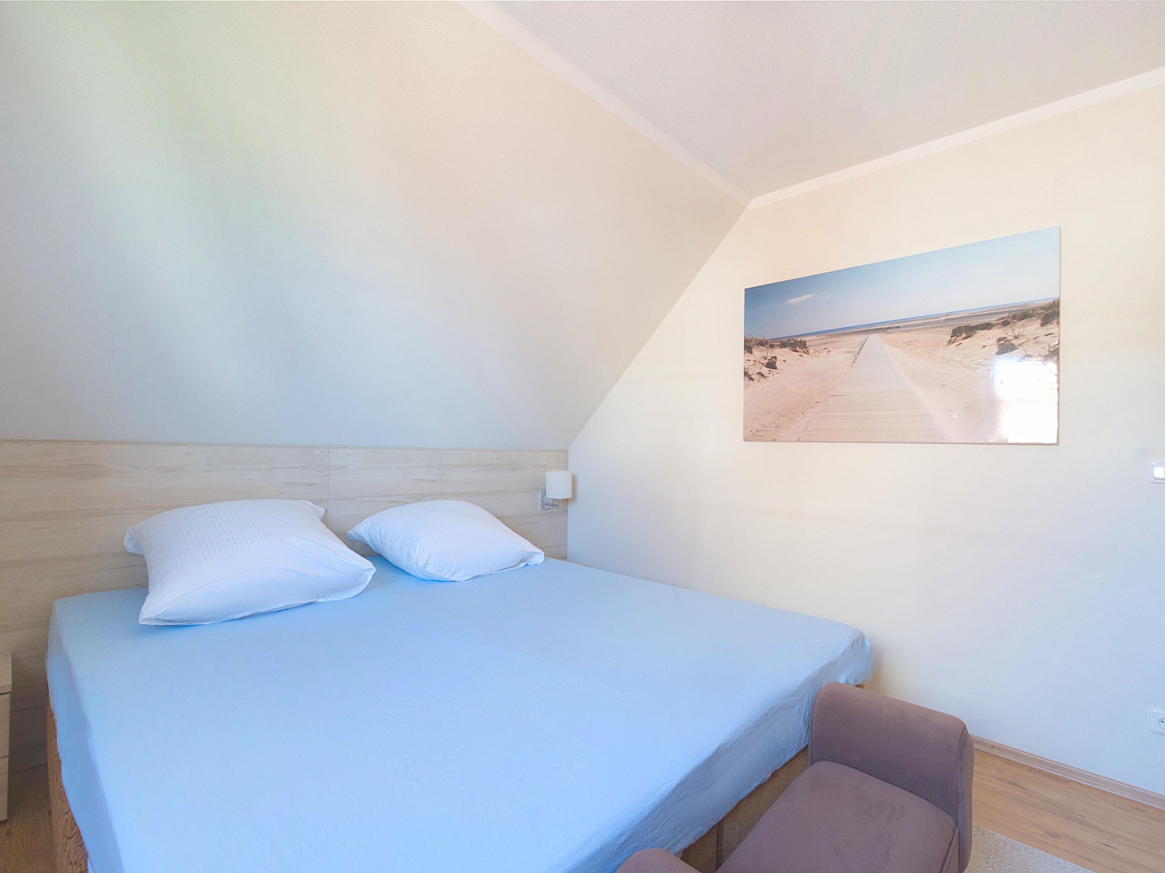 Haus Glückstal, Ferienwohnung 06, großes Schlafzimmer mit Doppelbett