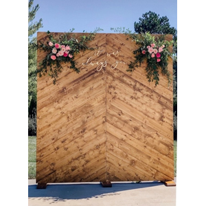 wooden wall with florals on top 