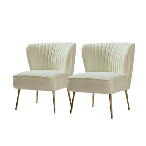 white velvet tufted chairs with gold legs 