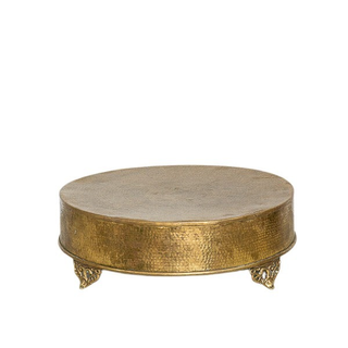 Large hammered brass cake stand with ornate feet
