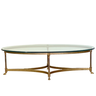 Oval glass and brass coffee table