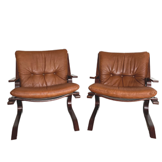 1970's brown leather and wood lounge chairs