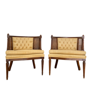Mid-century buttery gold chairs ith dark wood frame and wicker siding