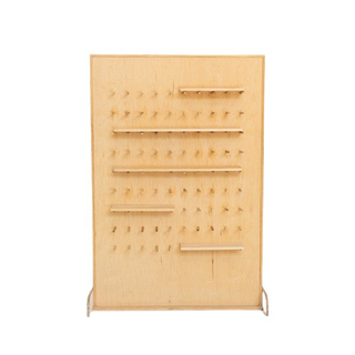Peg board wall used for donut display, photo display, party favor holder