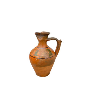 Anttique terracotta jug
Rentals 
Austin Event Rentals
