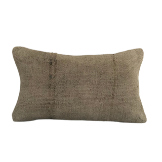 Dusty oatmeal grey hemp pillow with dark brown subtle detail
