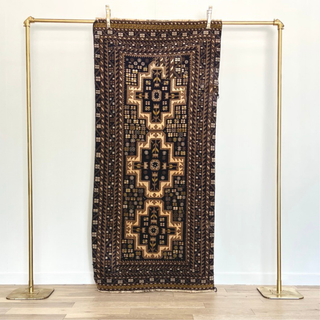 Vintage wool rug with tan, brown and black accents