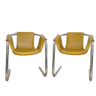 Yellow leather cantilever chairs with chrome legs
