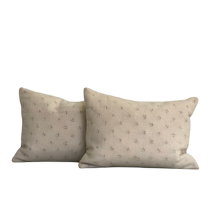Wool creamy soft pillows with x detail
