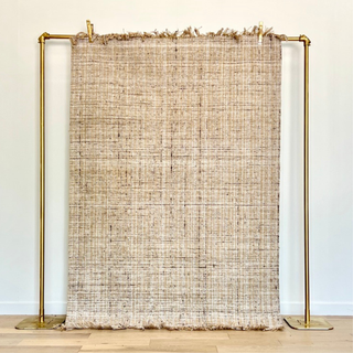 Cream and beige woven rug
