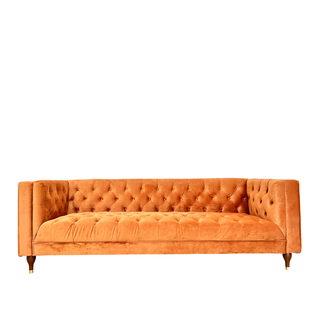 Soft orange velvet button tufted sofa