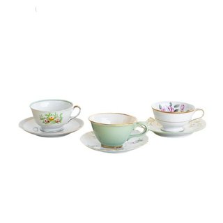 Mismatched vintage floral tea cups and saucers
