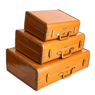 Vintage camel colored suitcases