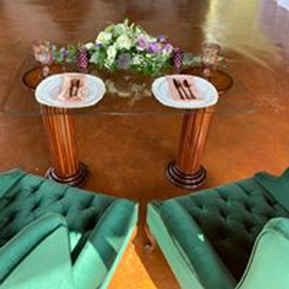 Glass top table with wood bases