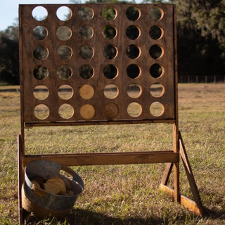 Stained wood connect four comes with dark and light solid wood disks 