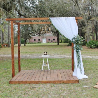 Stained pergola with floor. for florals and drapes