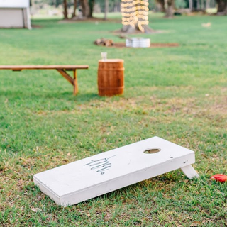 White painted cornhole boards comes with 2 sets of bags 