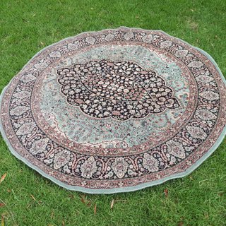 Round Green and Red Rug