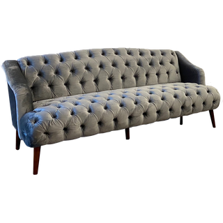 Gray tufted velvet sofa
