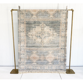 Muted teal and taupe fringed rug